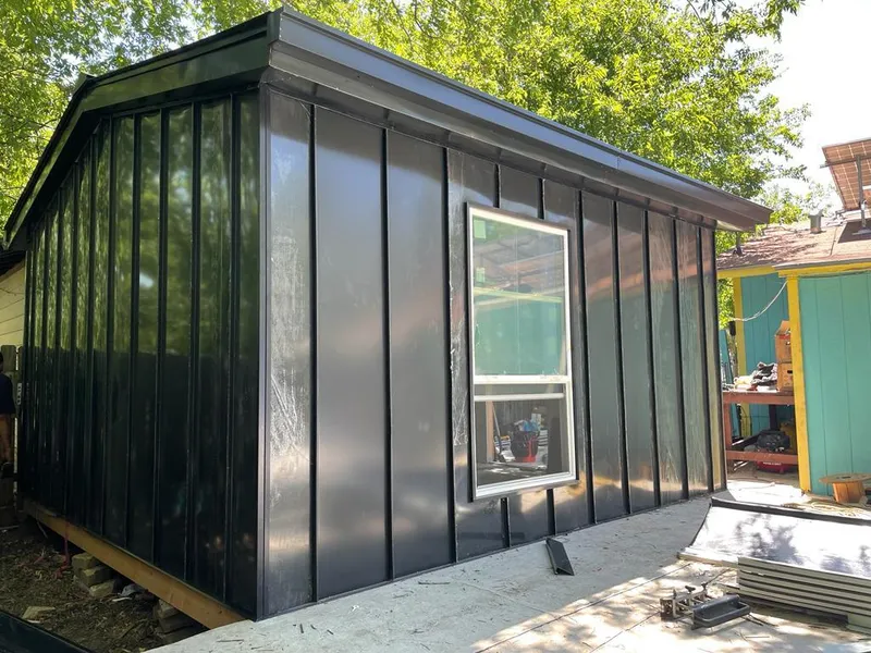 Black standing seam metal wall panels for Roof Inspection in North Auburn