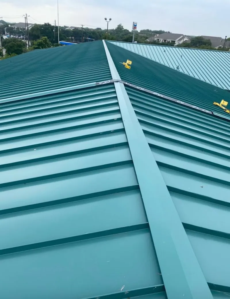 Green commercial metal roof ridge and valley for Metal Roof Repair in North Auburn